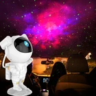 Декоративная светодиодная лампа-проектор в виде астронавта, звездного неба
