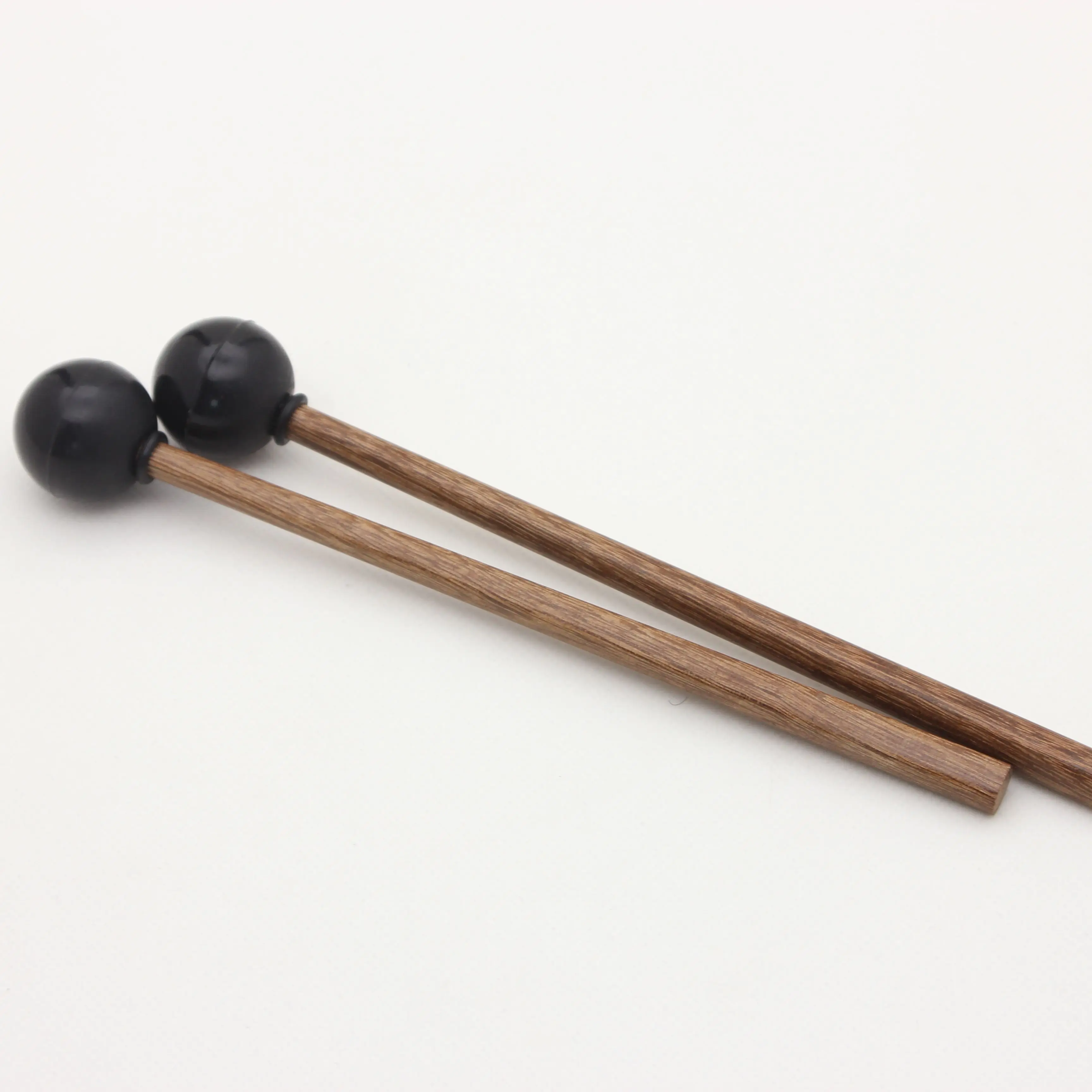 rubber mallet or stick |
