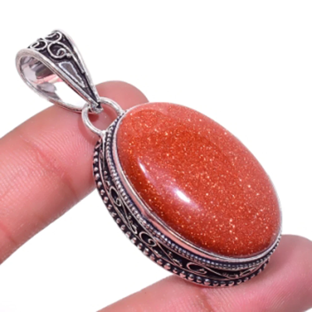 

Sun Stone Pendant Silver Overlay over Copper , 53 mm, P6697