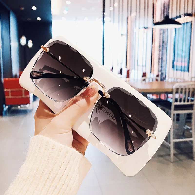 

New Arrived Rimless Large Lenses And Tinted Tan Pink Sunglasses For Women
