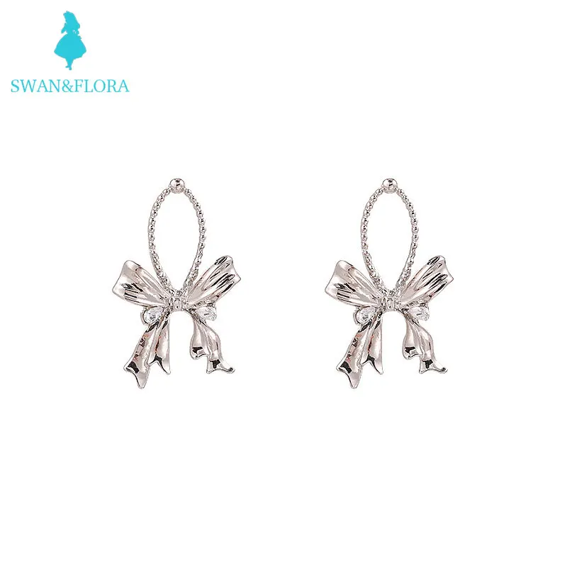 

Three dimensional Bow Earrings female autumn 2021 new style hip hop metal 925 silver needle Earrings