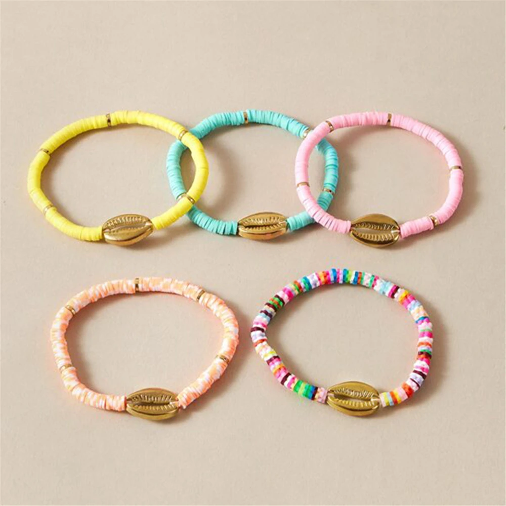 Женский браслет в виде ракушек розовый и белый ручной работы богемном стиле |