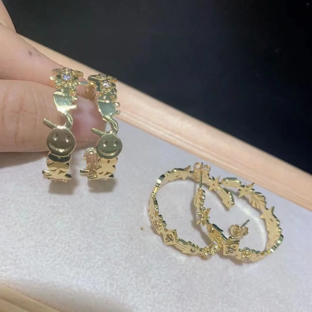 

Партиями по 5 пар, Счастливого лица Хамса звезда глаз из цветного шрусталя с золотыми гвоздиками, рисунок со смайликом, brinco для женщин модные...