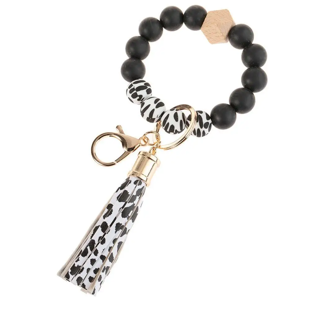 

Soft Pottery Ceramic Beaded Bracelet Keychain Trend Wooden Bead Keyring Key Chain Leather Tassel Pendant Jewelry Wholesale
