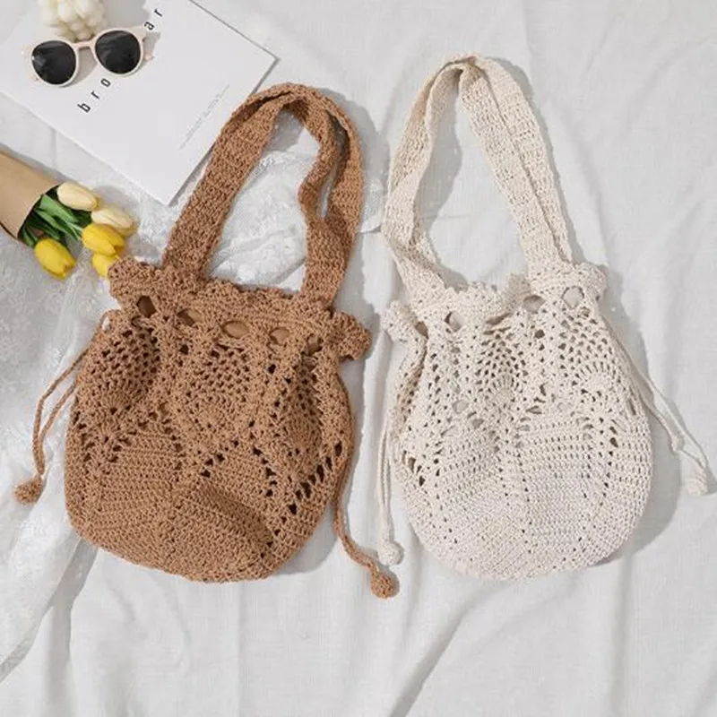 

Korean version of cotton woven bag women's 2022 new one-shoulder hand-held flower bucket straw woven bag holiday bag