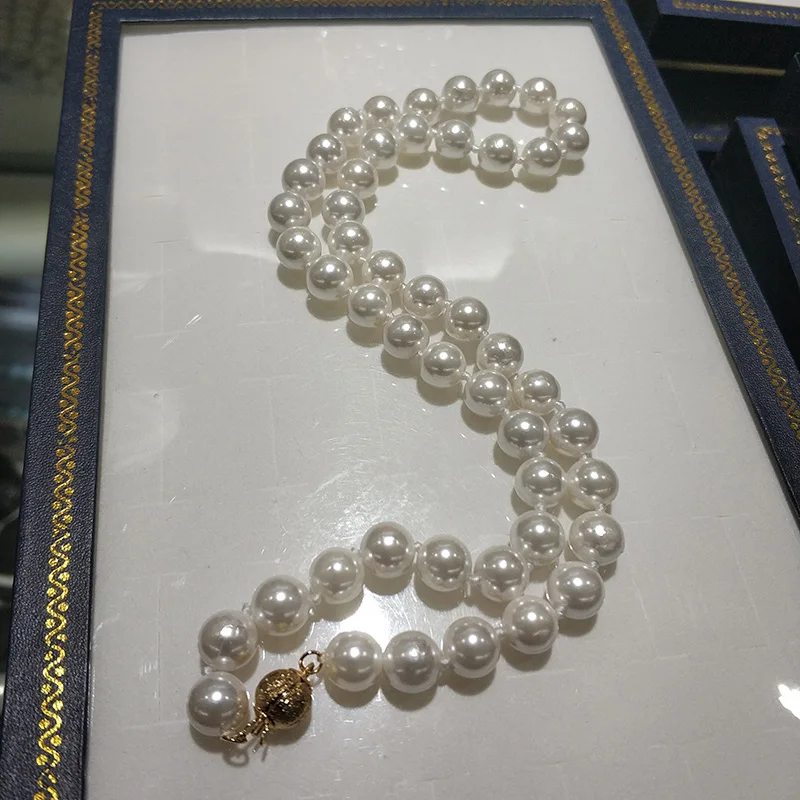 Ожерелье из ракушечных жемчужин JYX 8-8,5 мм круглой формы, белого цвета, естественного происхождения из моря с высоким блеском длиной 18 дюймов.