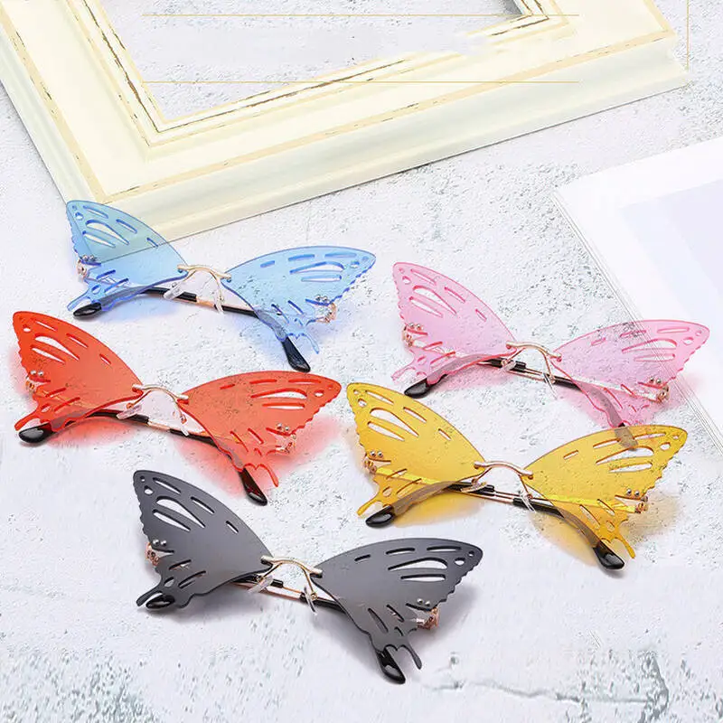 

Trendy Frameless Butterfly Sunglasses Women 2021 Luxury Brand Designer Fashion Ocean Lens Sun Glasses Female Personality Shades
