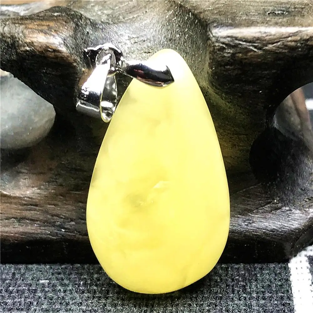 

Подвеска из натурального жёлтого янтаря, 24 х14х5 мм