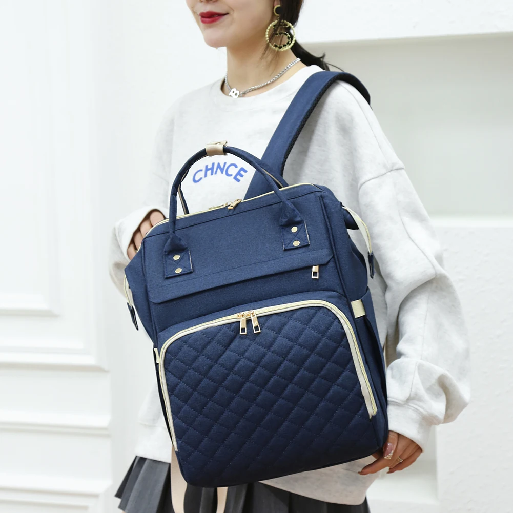 

Многофункциональный водонепроницаемый рюкзак для мам, вместительная сумка для подгузников на коляску, для путешествий и отдыха на открыто...