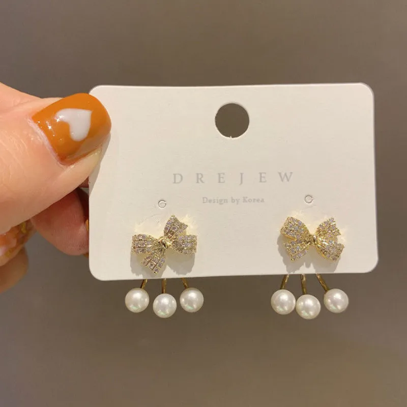 

New Trend Personality Pearl Diamond Bow Earrings Women's Romantic Temperament Design Sense Jewelry Earrings Wholesale