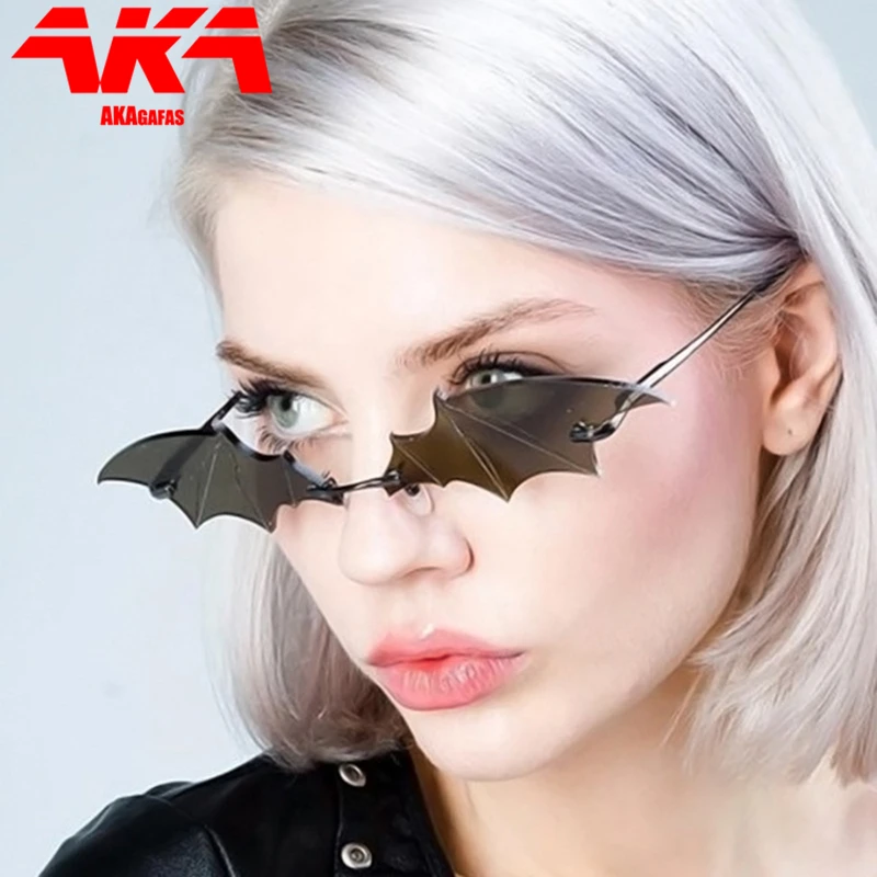 

AKAgafas Rimless Women Sunglasses Metal Sun Glasses for Women 2021 Funny Brand Designer Sunglasses Women Bat Modeling Okulary