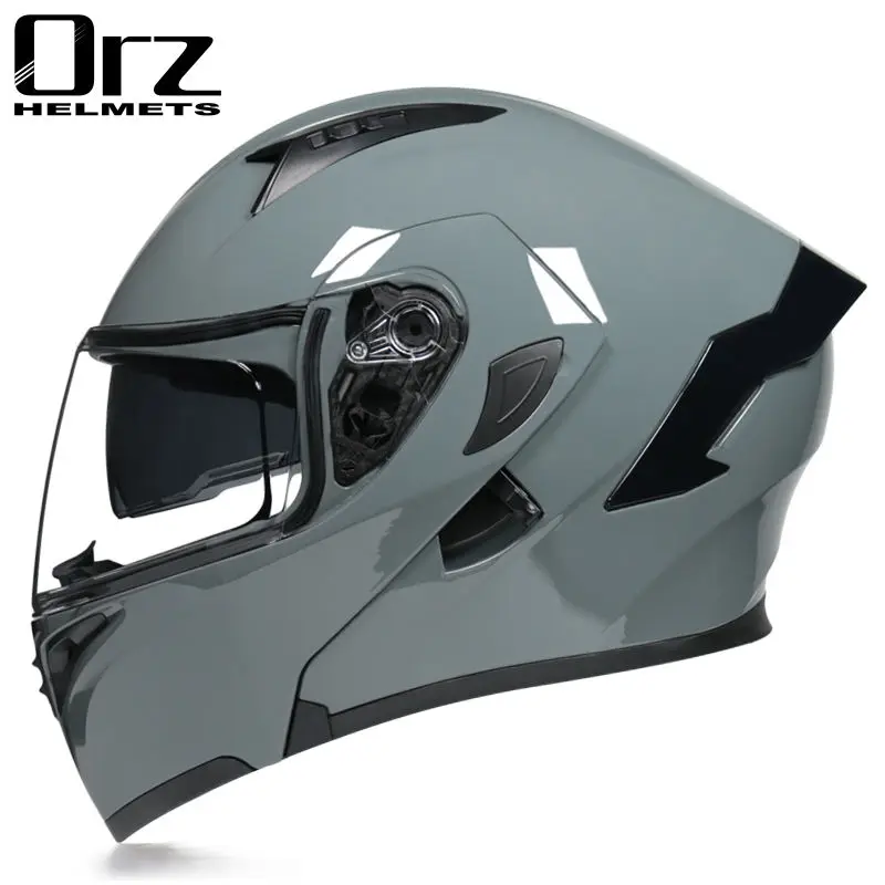 Modular motorcycle helmet with double sun visor and full face sun visor, used for racing and cross-country motorcycles