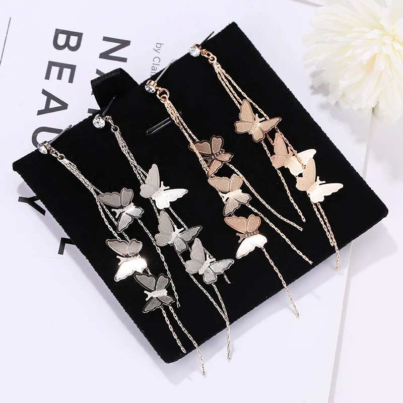 Элегантные длинные серьги гвоздики с бабочками и кисточками гипоаллергенные