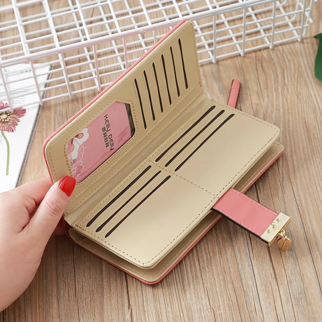 Фото 2019 Leather Women Wallet Hasp Fashion Trend Solid Color Long Fringed Hollow Leaf Card portefeuille femme Багаж и сумки 2019 Leather Women Wallet Hasp Fashion Trend Solid Color Long Fringed Hollow Leaf Card portefeuille femme Багаж и сумки