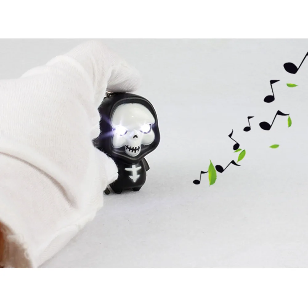 

LED Flashlight Keychain with Sound Ghost Shaped Key Rings Bag Pandent (White Eyes)