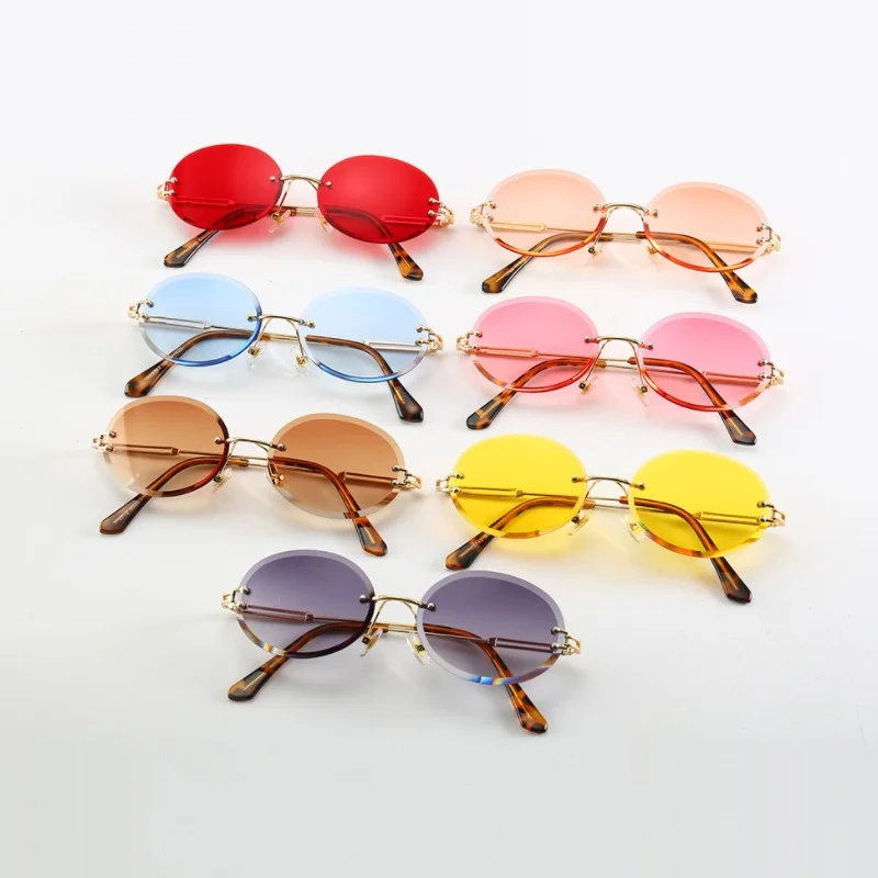 

Luxury Rimless Steampunk Men Sunglasses Fashion Oval Designer Women Sun Glasses Punk New Designer Shades