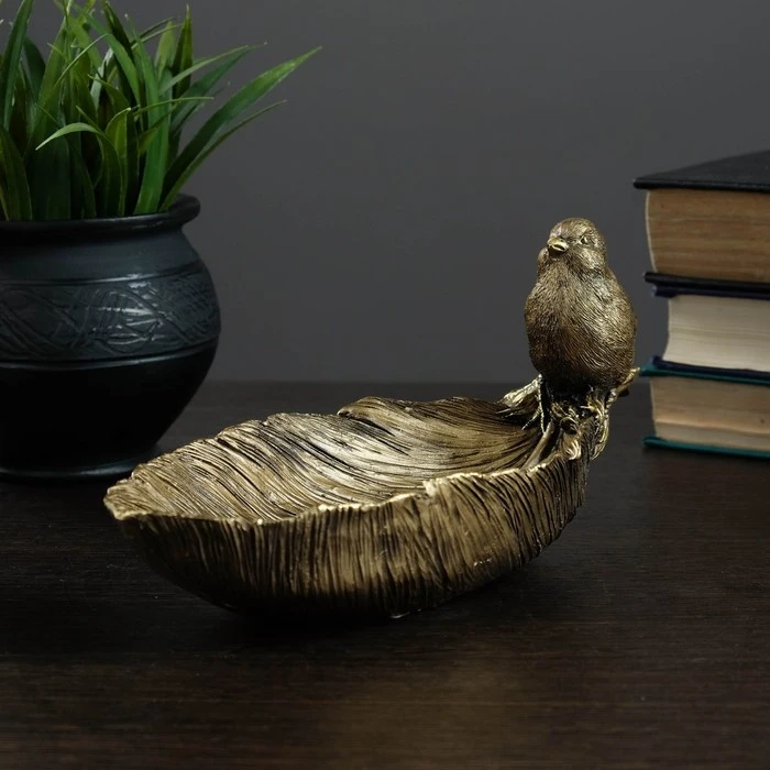 Подставка под мелочи "Птица на медсестре" золотая 25x10x10см 4241529 Аксессуары для украшений и упаковки.