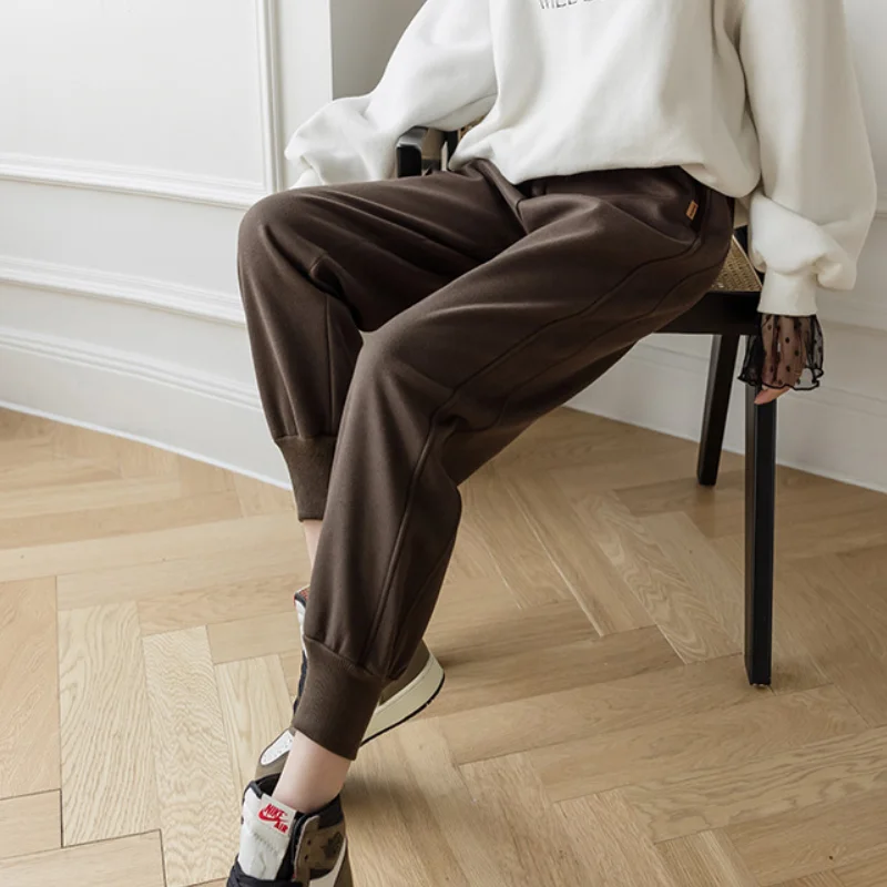 

2020 autumn and winter solid color plus woolen woolen women's elastic waist warm and comfortable feet comfortable casual trouser