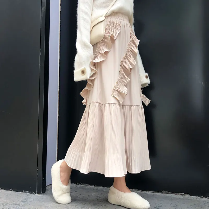 

Make pleated skirt qiu dong female han edition falbala temperament of a word skirt long skirts in irregular cake skirt