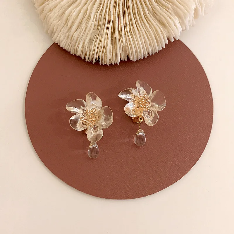 

Origin Summer Natural Style Arcylic Flower Clip Earring for Women Waterdrop Blue Champagne Color Earring Jewelry Pendientes