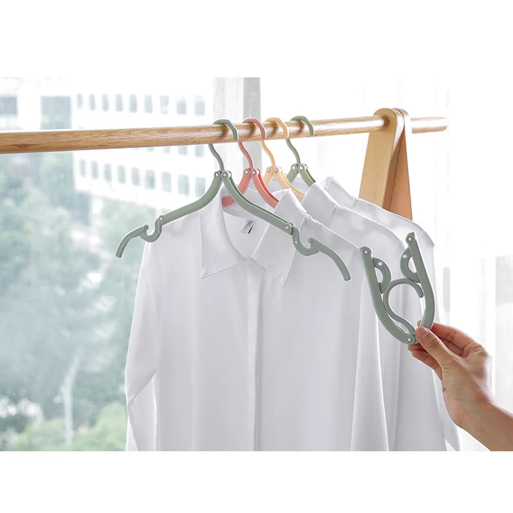 

8pcs Travel Portable Folding Hanger Multifunction Stretch Clothes Plastic Travel Hangers M56