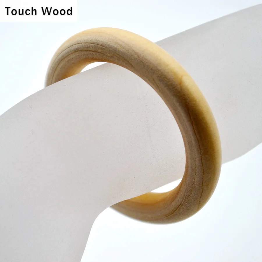 

Natural Wood Children Accessories Bracelet Inner diameter: 4.8cm Outer diameter: 6.8cm Thickness: 1cm