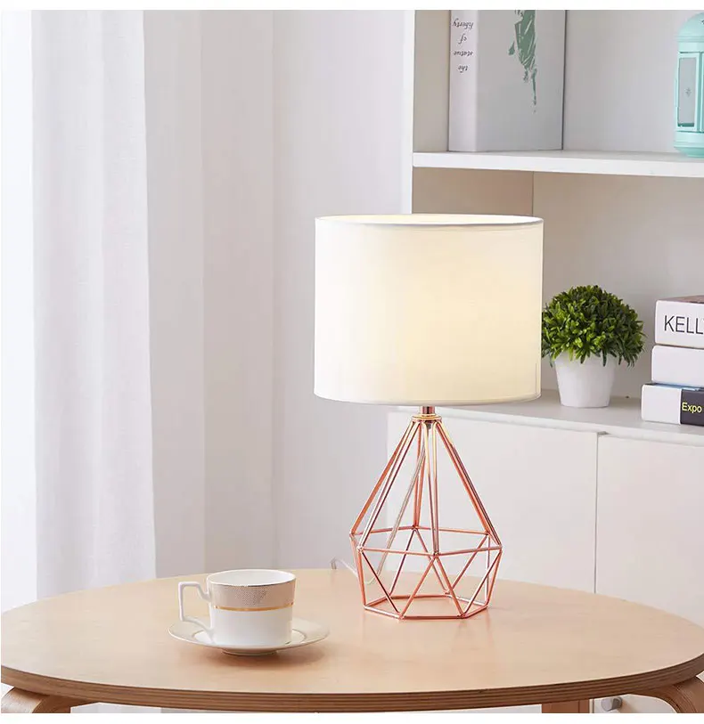 Modern minimalist metal paint rose gold hollow diamond design cloth table lamp personality diamond LED lighting bedroom decor