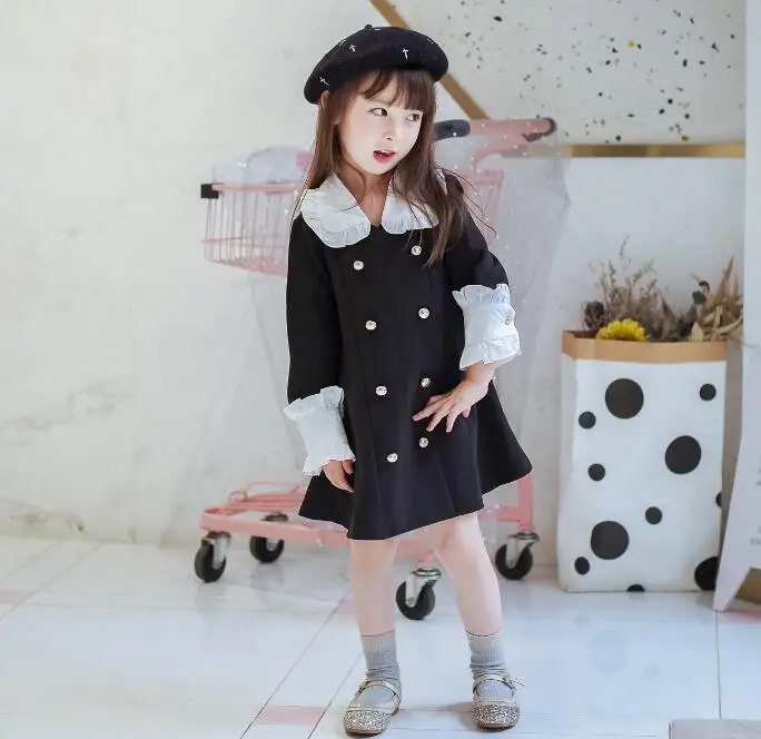 Черно-белое платье в стиле пэчворк 2019 г. Осенне-зимние двубортные платья с