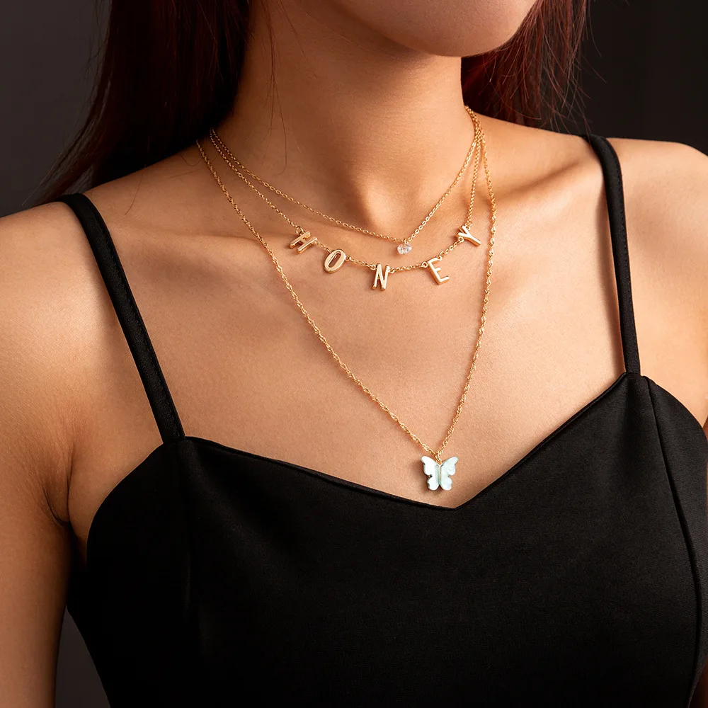 

Fashion simple ladies wild necklace butterfly letter multi-layer necklace clavicle chain