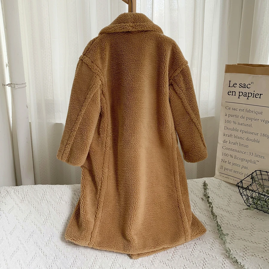 Женская длинная куртка на пуговицах элегантная однотонная утепленная из