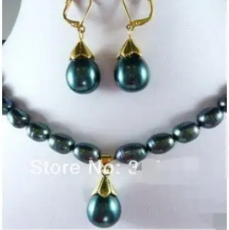 

Ожерелье и серьги из натурального черного жемчуга