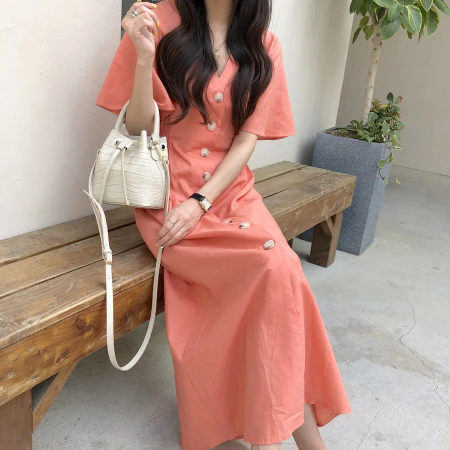 

Casual all-match long V-neck single-breasted solid color waist slimming dress blouse skirt