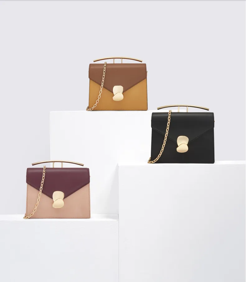 Женская сумка клатч с металлическими ручками роскошная переносная на плечо