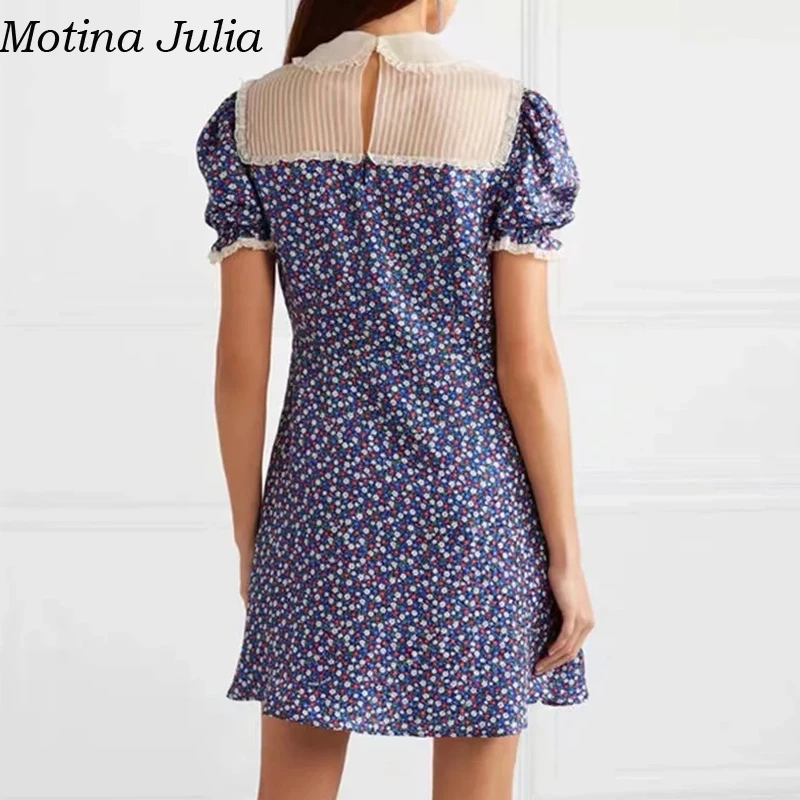 Женское кружевное платье с цветочным принтом Motina белое Повседневное на