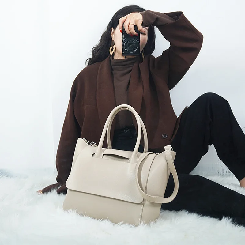 

2020 new simple fashion portable large capacity pure color handbag pu leather shoulder bag female messenger bag female bag