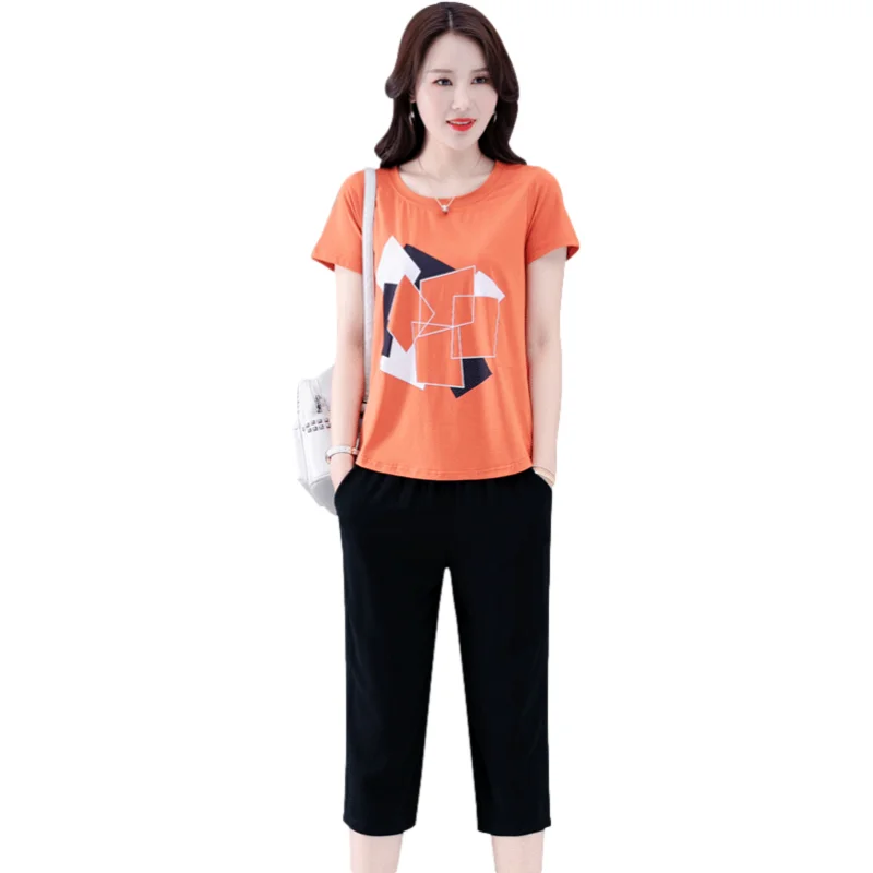 

Fashion Casual Suit Female 2021 Summer New Style Printed Short-Sleeved T-Shirt+Solid Color Cropped Pants Sports Two-Piece Woman