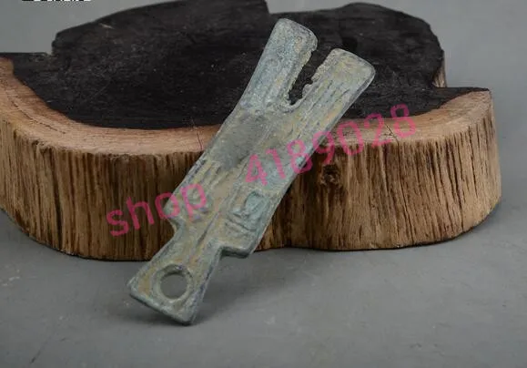 Старинные бронзовые монеты ножей в елочку антикварные сосуды коллекционные