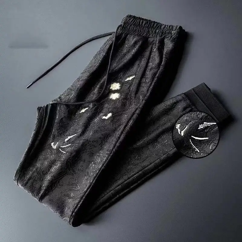 

Light luxury dark jacquard camouflage sports pants for men