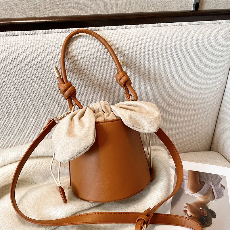 

New Bucket bag design one-shoulder slant bow handbag girl with bag
