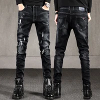 new stretch jeans with holes and mens casual trousers with slim feet in korean version