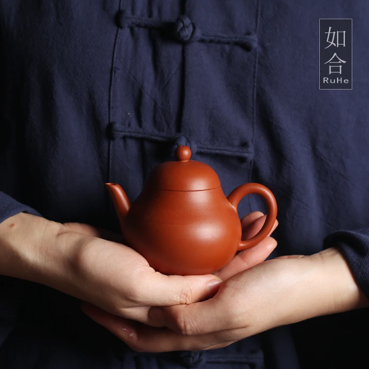 

Как в исинской глине фиолетовый песок чистая красная грязь эскиз кунг-фу Чжу Классическая груша маленький горшок узкий полуручной чайник