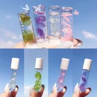 Блеск для губ прозрачный увлажняющий бесцветный с фруктовым лепестком