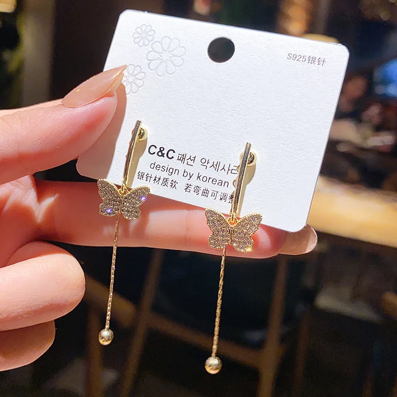 

Korean 925 silver needle butterfly modeling temperament super fairy earrings for women