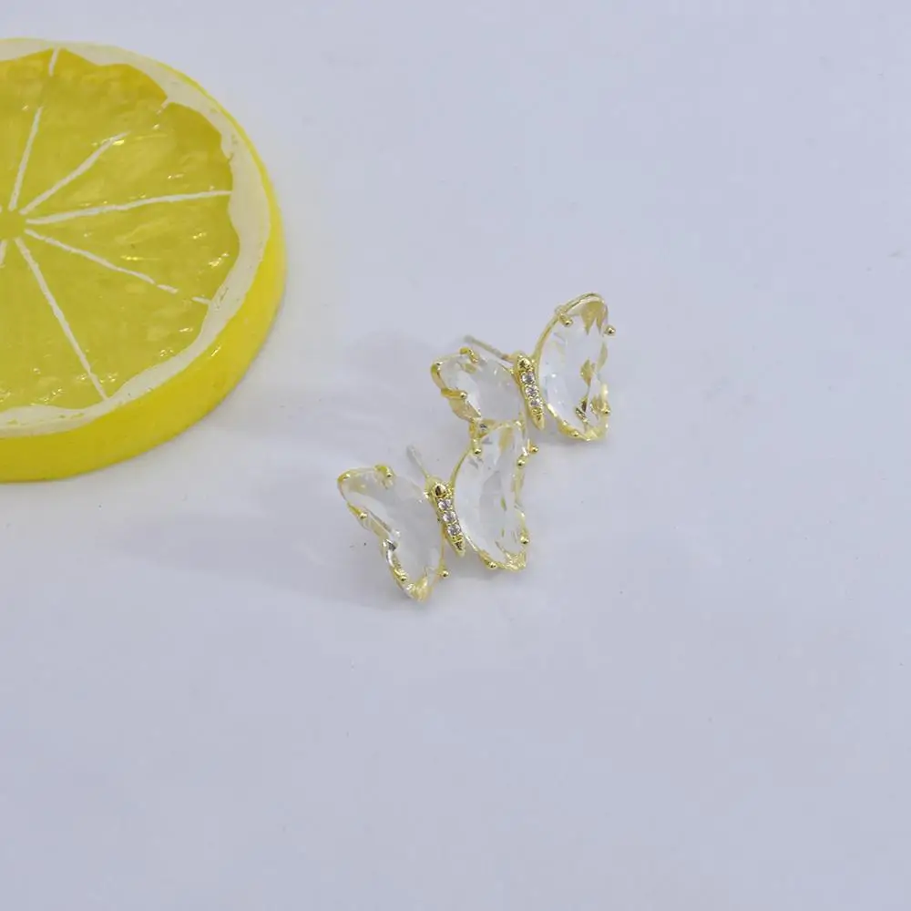 

The New Glass Sparkling Butterfly with Rhinestone Earrings Color Needle Earrings Fashion Wild Short Earrings.