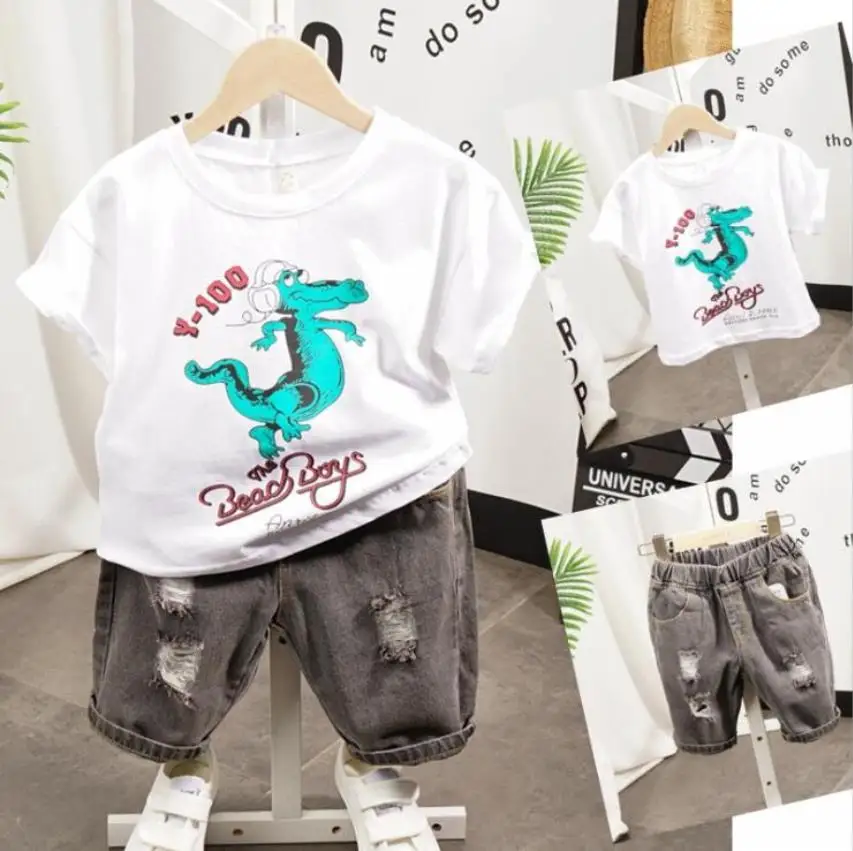 

Комплекты детской одежды, лидер продаж 2022, летний стильный топ и шорты, комплект из 2 предметов, футболка и штаны для мальчиков и девочек, спо...