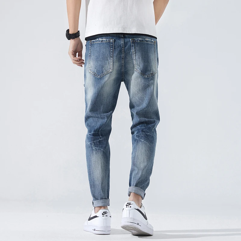 Рваные джинсы мужские облегающие синие Стрейчевые весенние состаренные в стиле