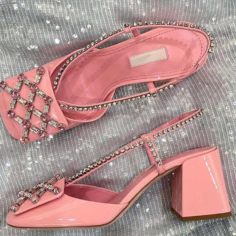 

Women's shoes new pink rhinestone high-heeled sandals female word with fashionable thick heel open high heels Baotou