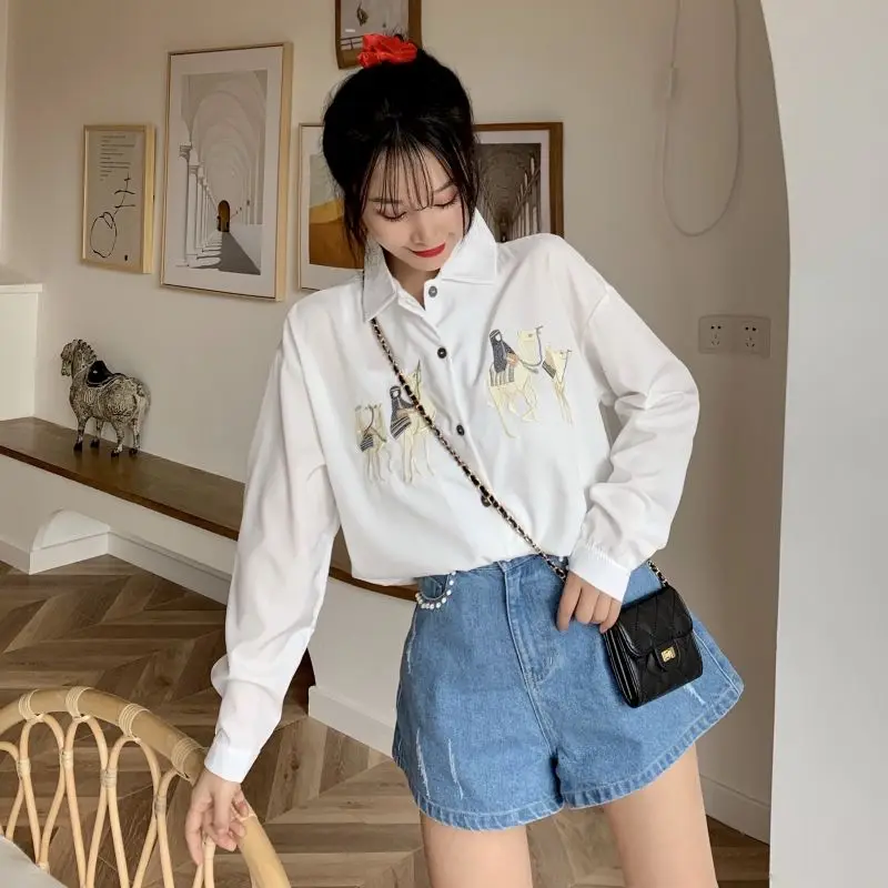 

White shirt women's design sense minority spring clothes 2020 Korean version versatile loose embroidery Top Long Sleeve Shirt