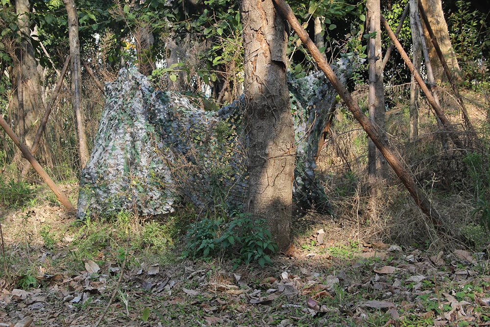 Фотокамера с сетчатыми камуфляжными жалюзи отлично подходит для защиты от