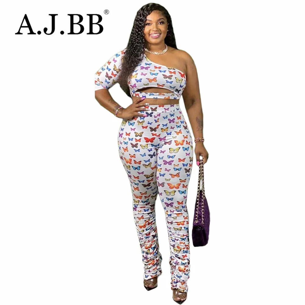 

Новинка 2020, Модный повседневный комплект из двух предметов с мультяшным принтом, Облегающая рубашка на одно плечо с коротким рукавом и брюк...